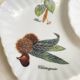 Tea cup, solitary service, naturalistic decoration, in Limoges porcelain.