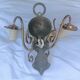 Pair of wall sconces in gilded brass