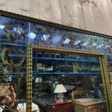Venetian mirror in eglomise glass and gilded wood
