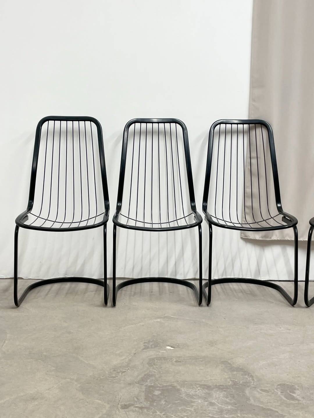 4 black wire metal chairs