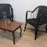 Paire de fauteuils noirs en rotin