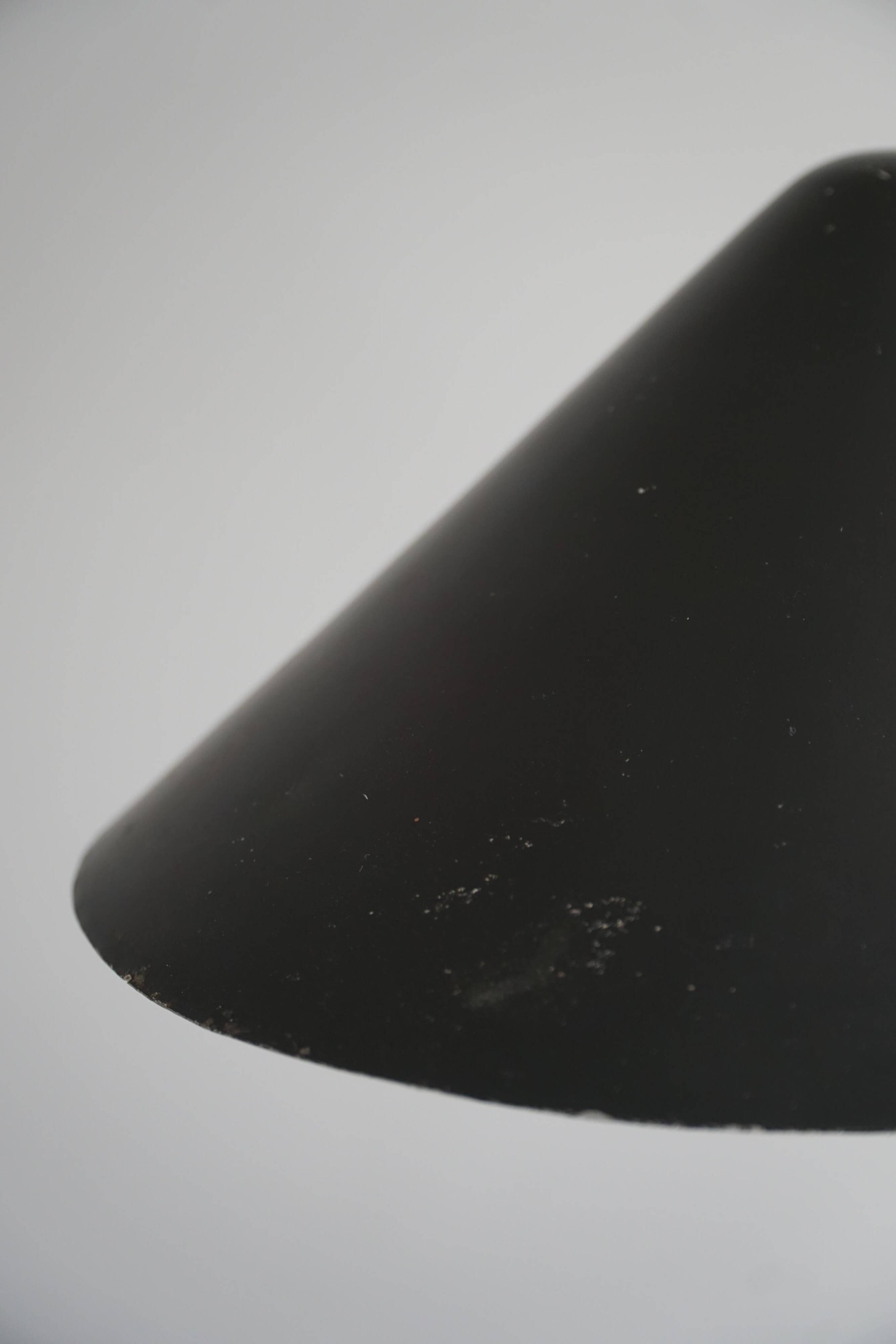 Modern adjustable Danish table lamp in metal, made by Louis Poulsen, 1950s.