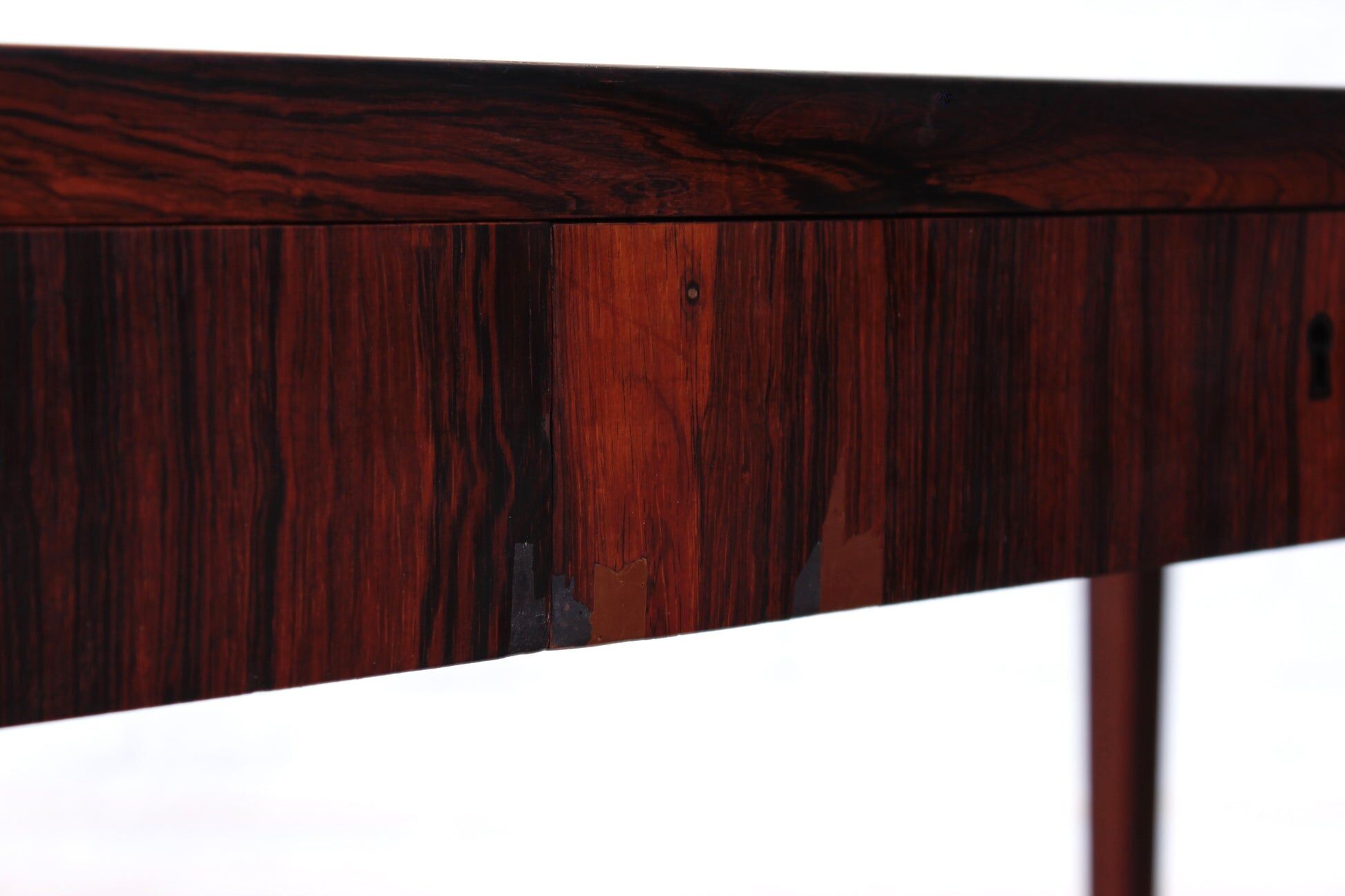 Minimalist rosewood desk by Riis Andersen