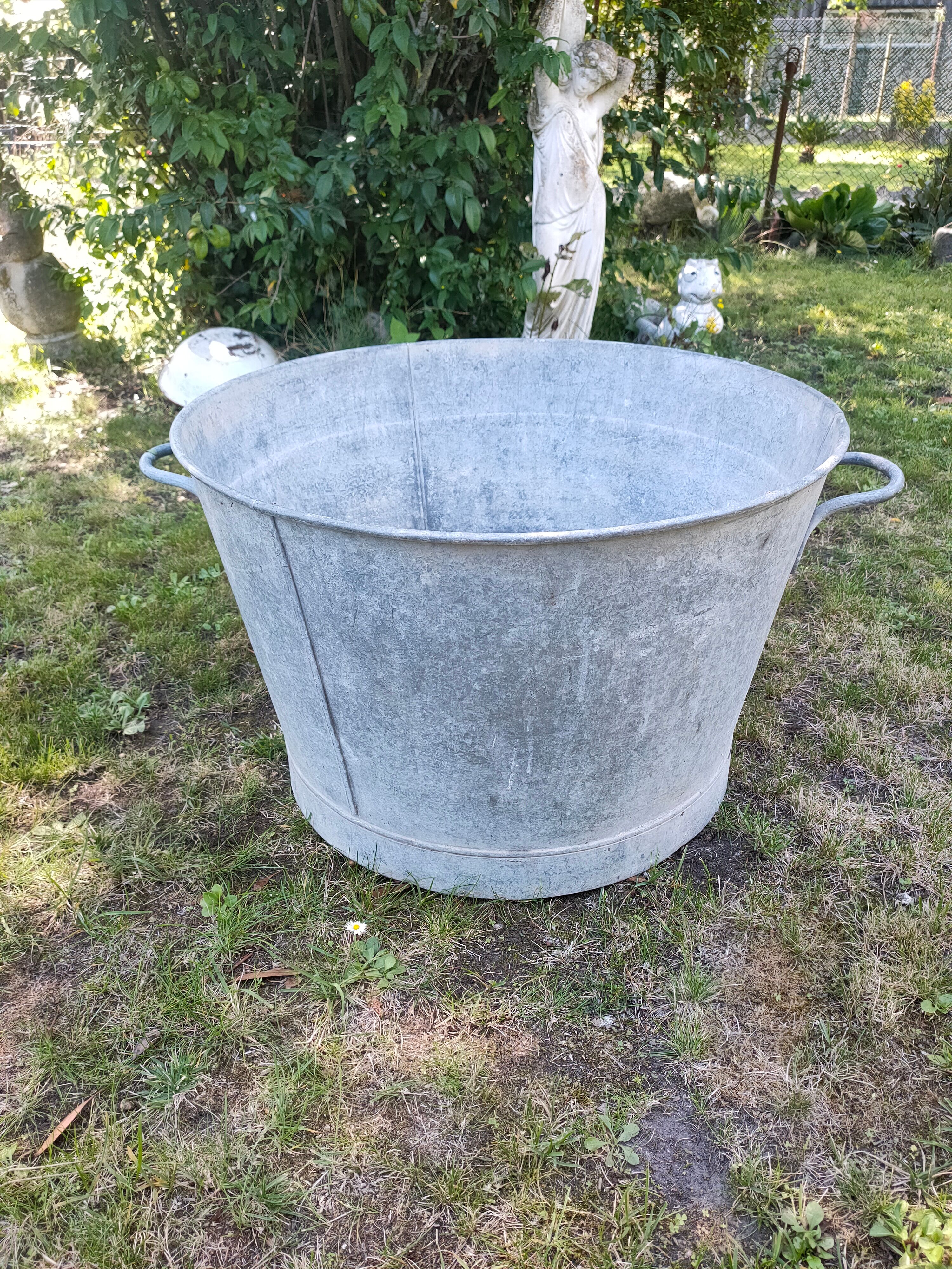 Old round zinc basin