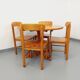 Suite d’une table ronde avec rallonge et 4 chaises vintage en pin des années 60 70