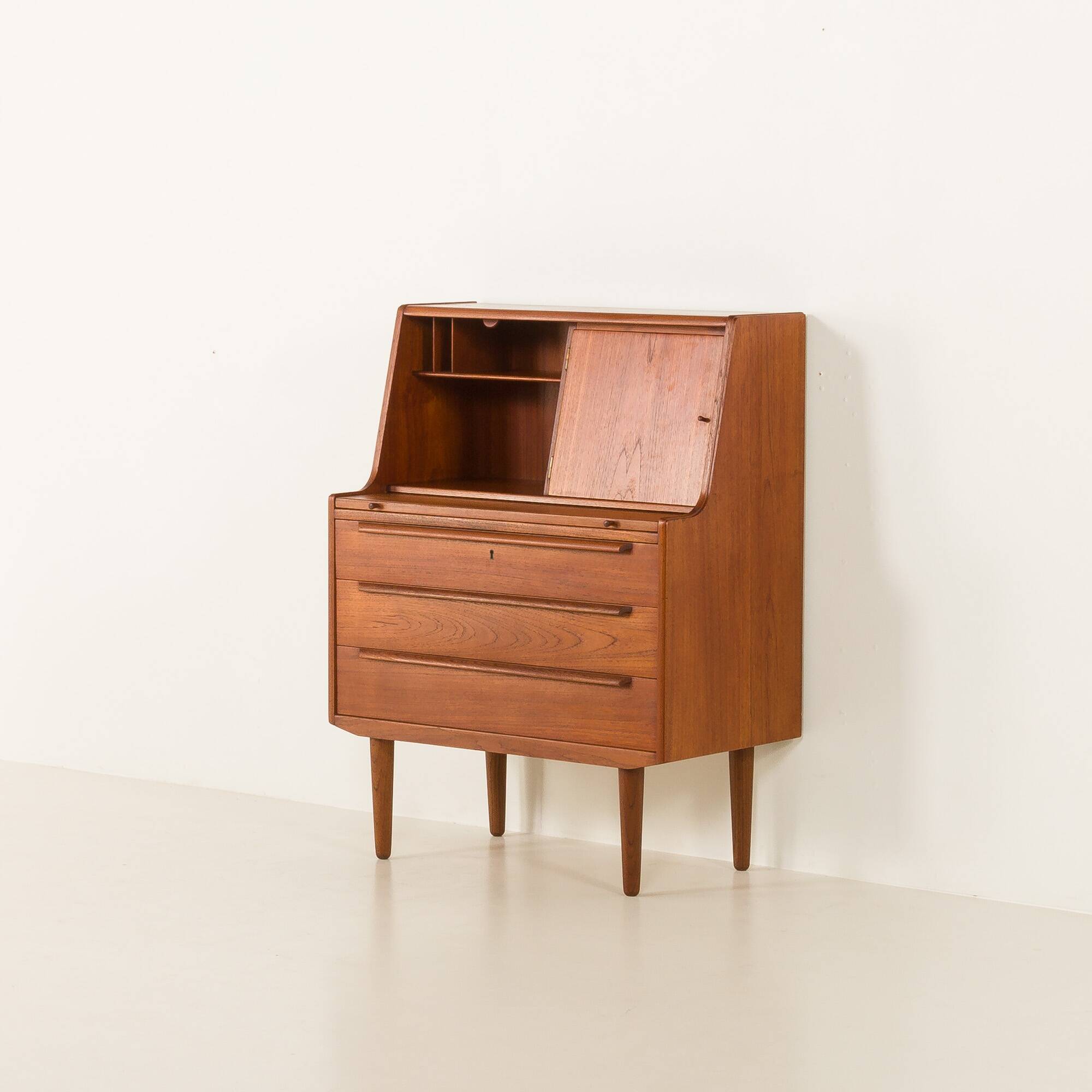Danish  mid century teak  bureau with a hidden vanity by Ølholm Møbelfabrik