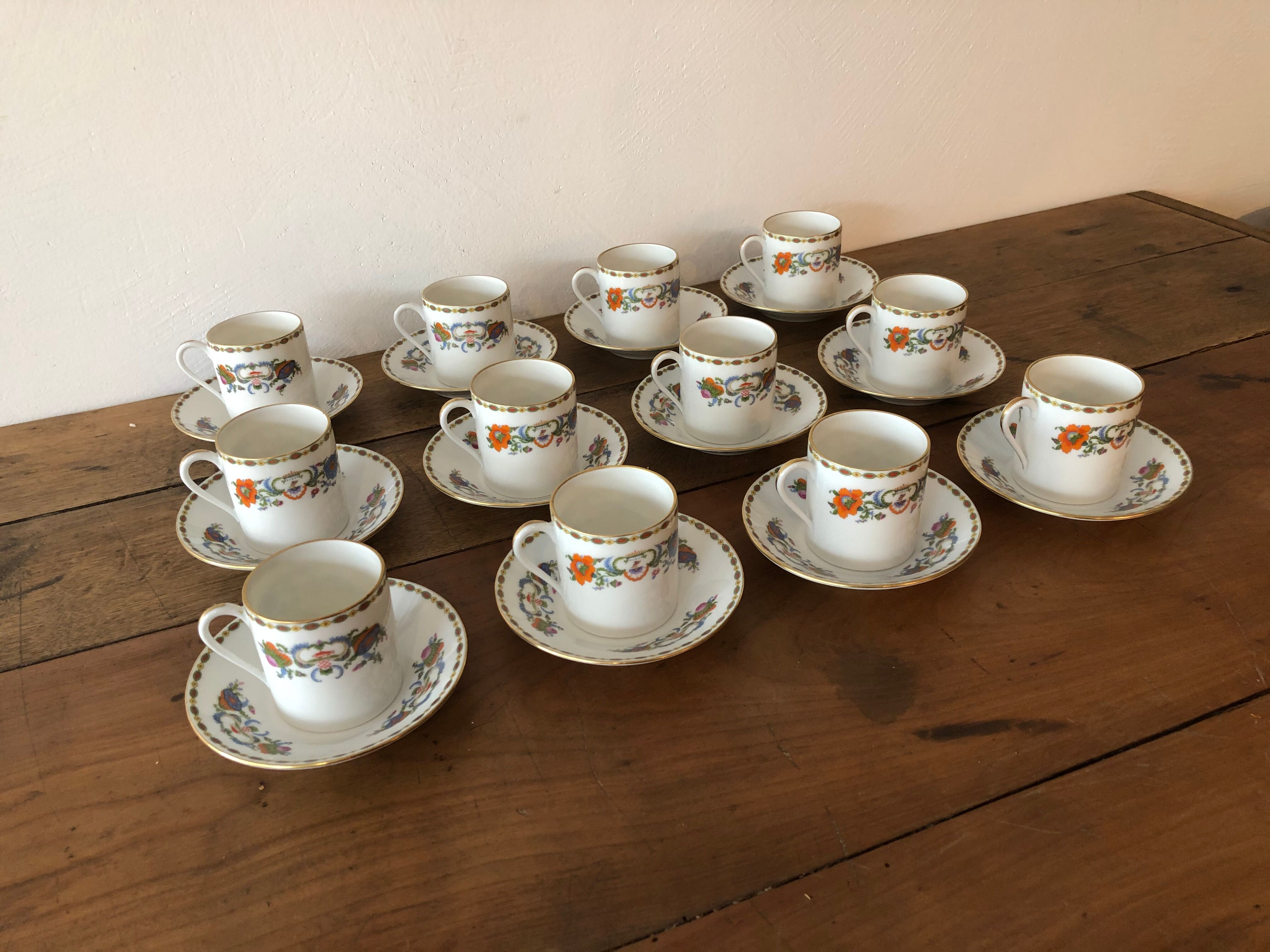 Service of 12 porcelain coffee cups, Raynaud, Limoges, 1950s.