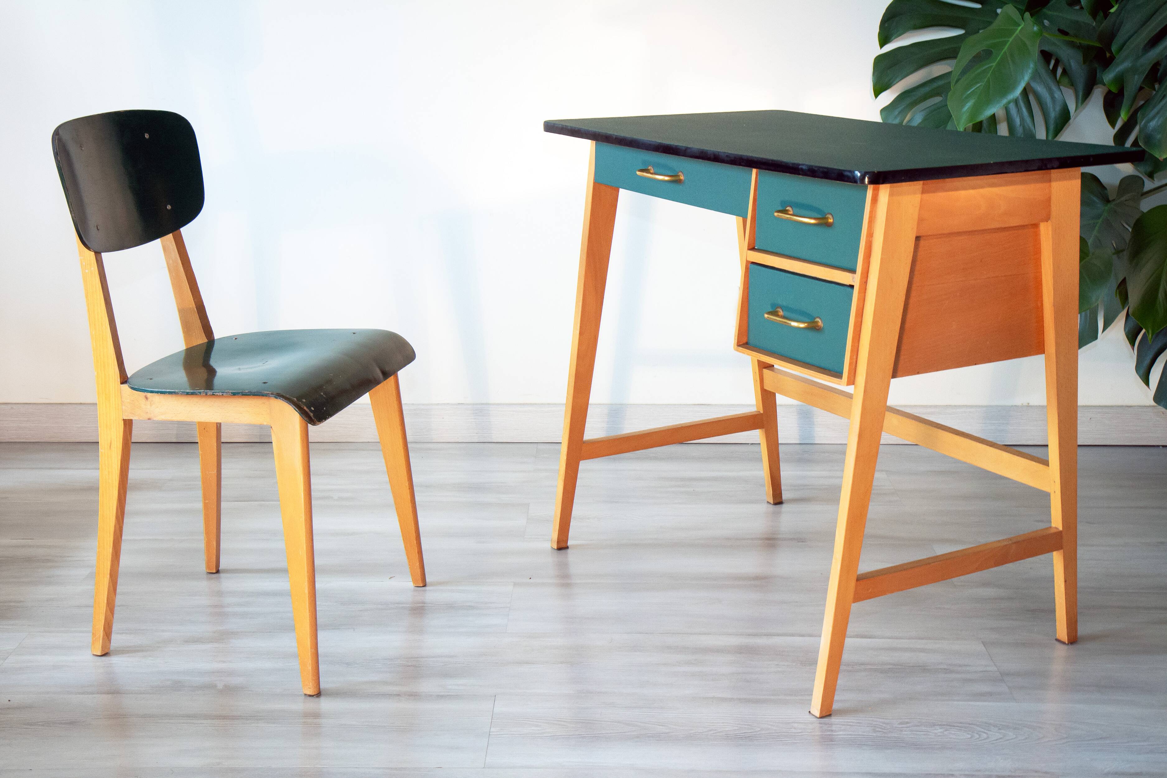 Desk and its green and wood chair, 1950s