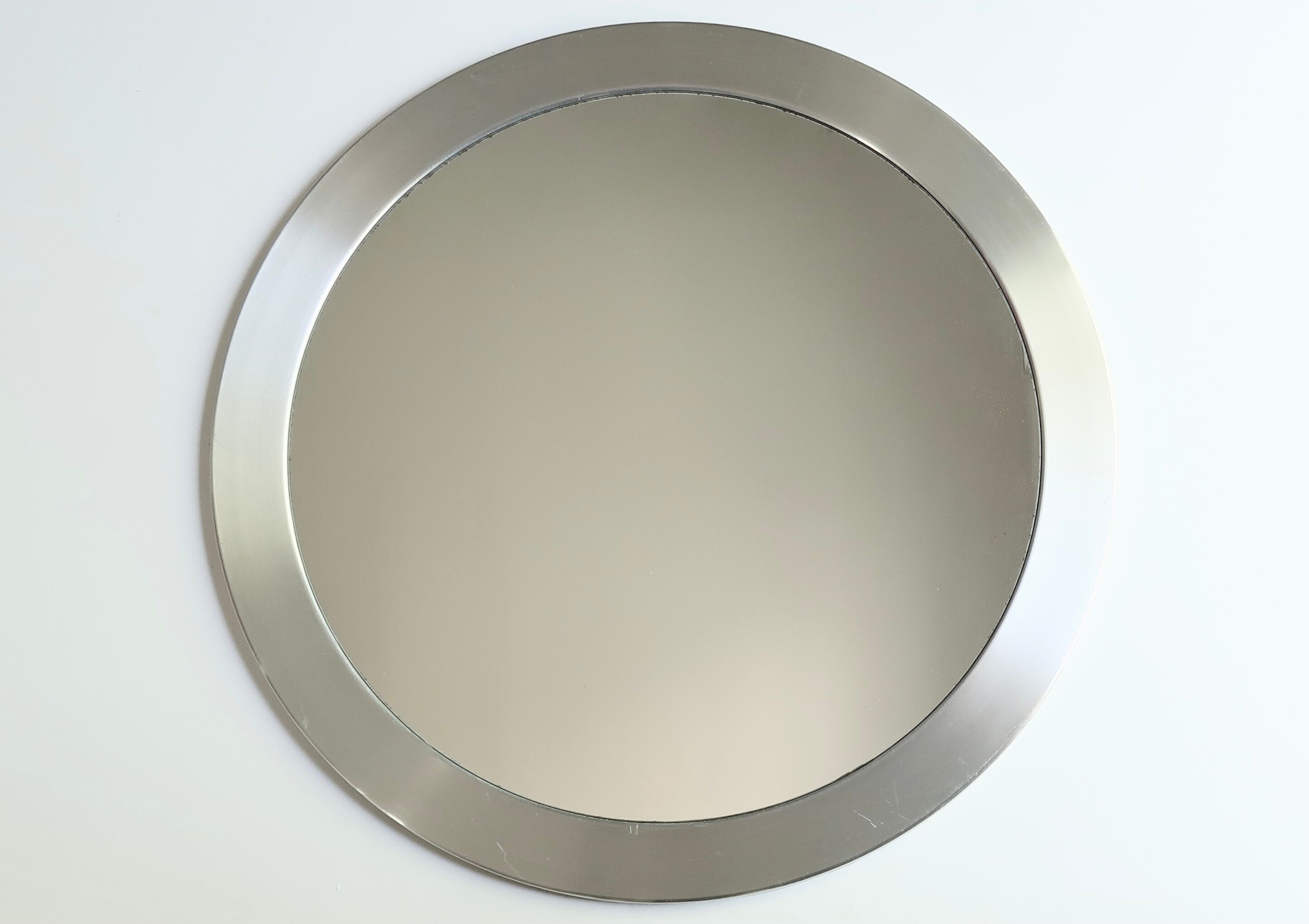 Round brushed aluminium mirror, 1970s