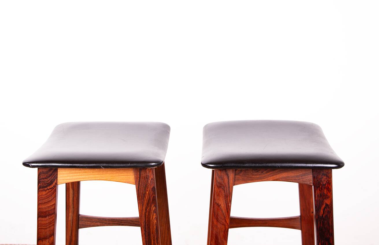 4 Danish high stools, rosewood and black leather, Knud Bent for Dyrlund.