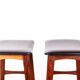 4 Danish high stools, rosewood and black leather, Knud Bent for Dyrlund.
