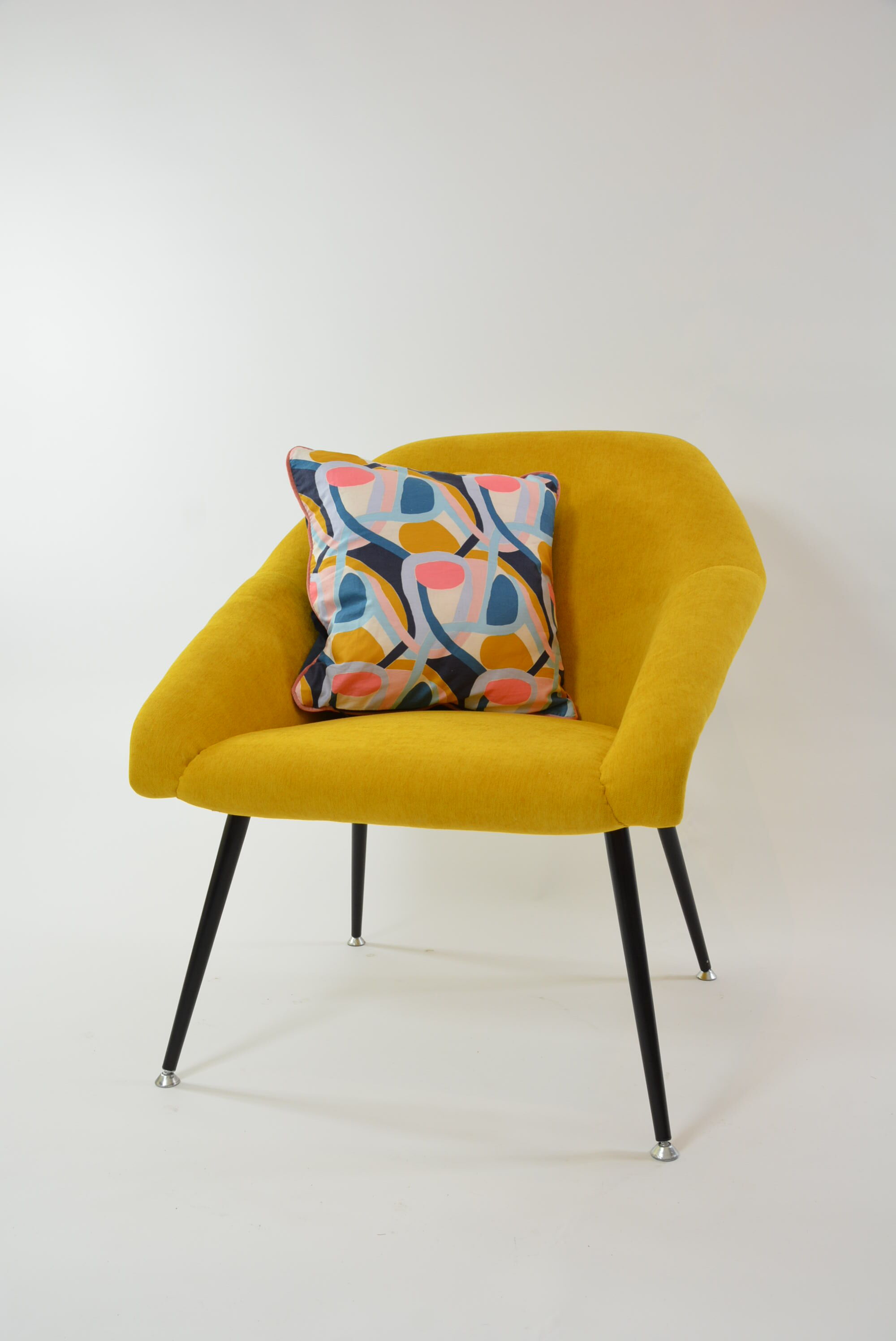 Yellow shell armchair
