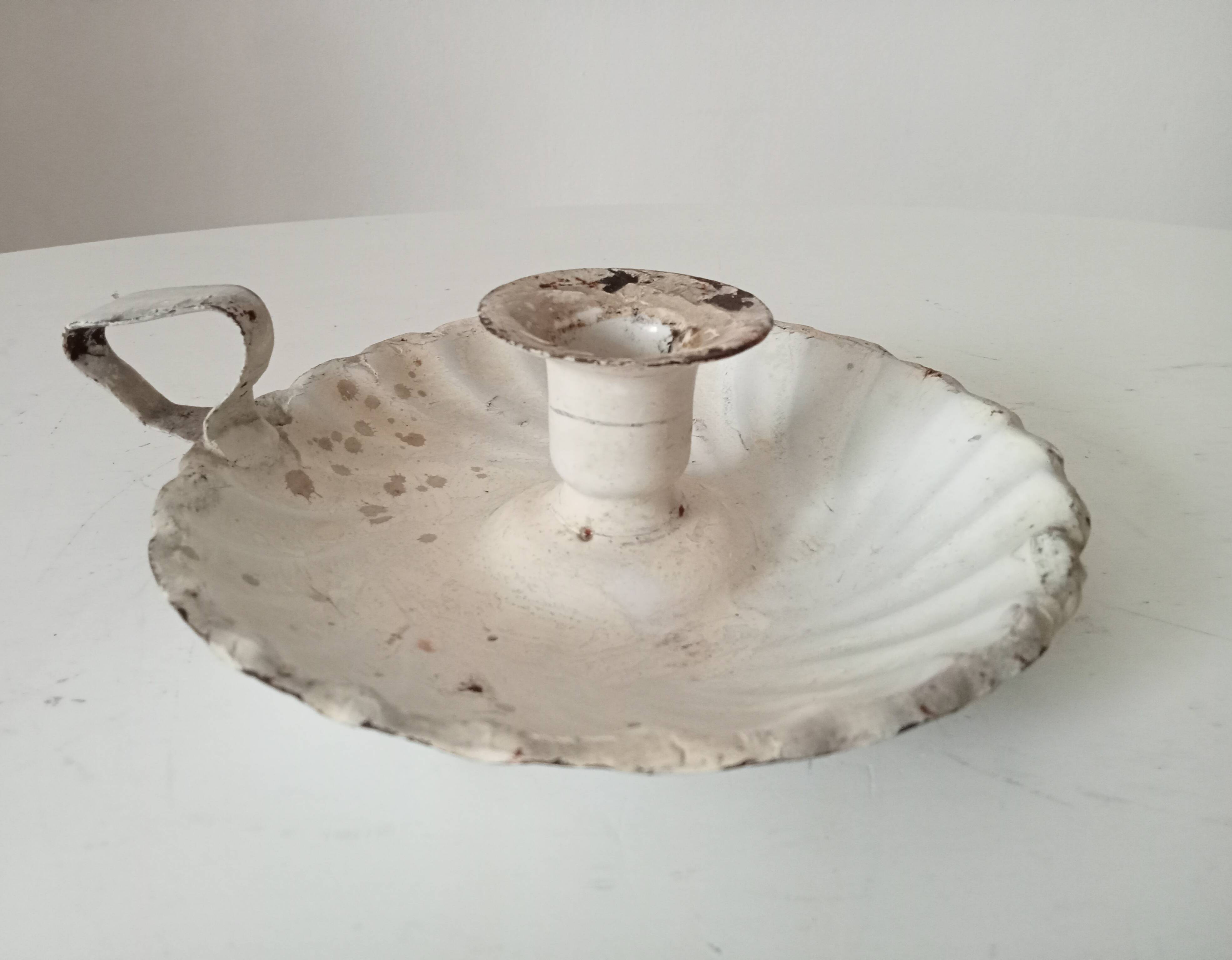 Antique hand candle holder "cellar rat" in enamelled metal