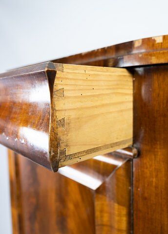 Antique late empire corner cabinet of mahogany and in great vintage condition from the 1840s.