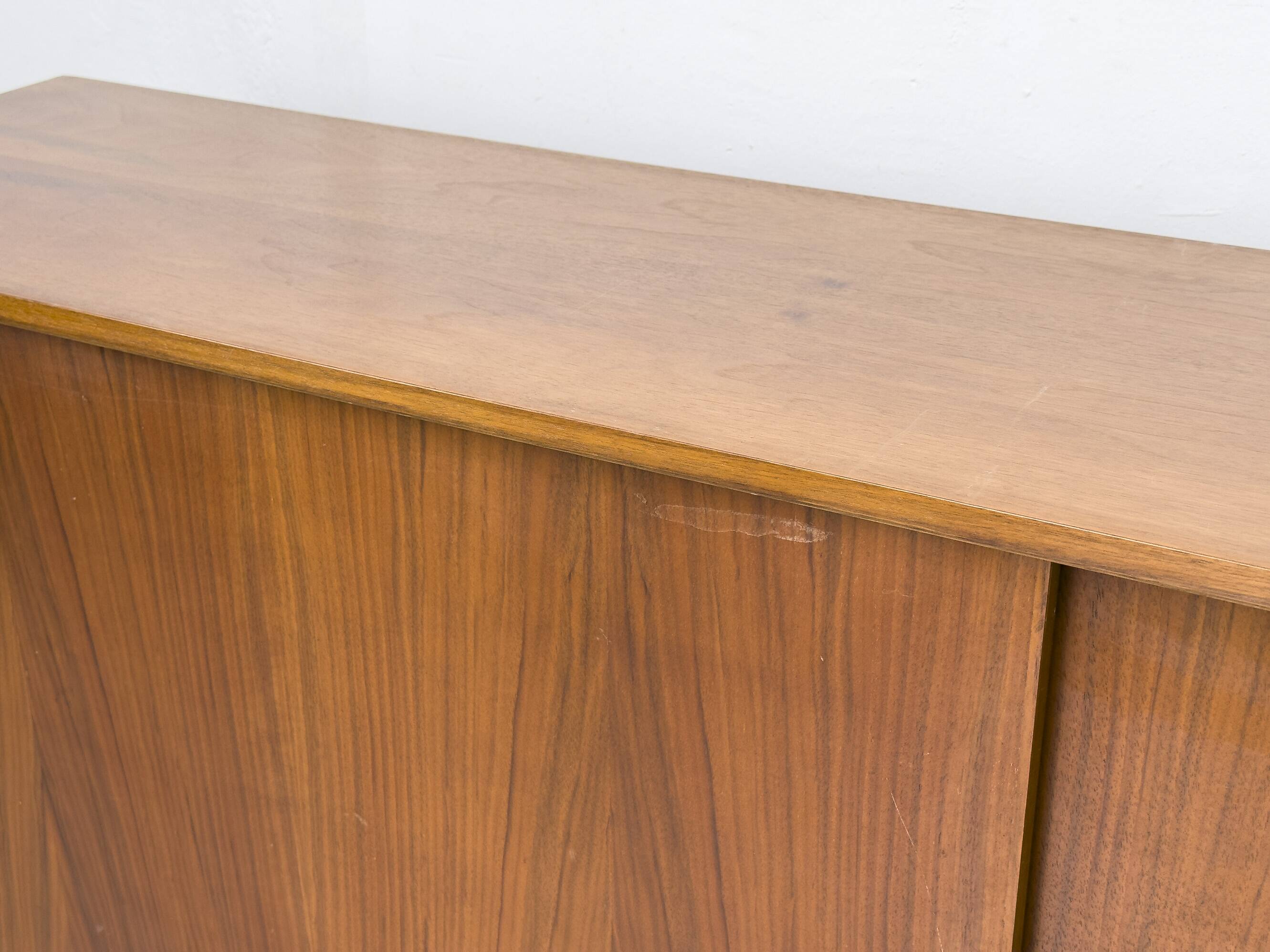 Walnut sideboard with sliding doors by Franzmeyer, 1959