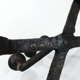 Pair of brutalist wrought iron candlesticks, France, three lights, signed