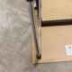 Fauteuil b64 Breuer noir cannage accoudoirs et tampons neufs