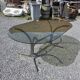 Silver metal table with smoked glass top from the 1970s.