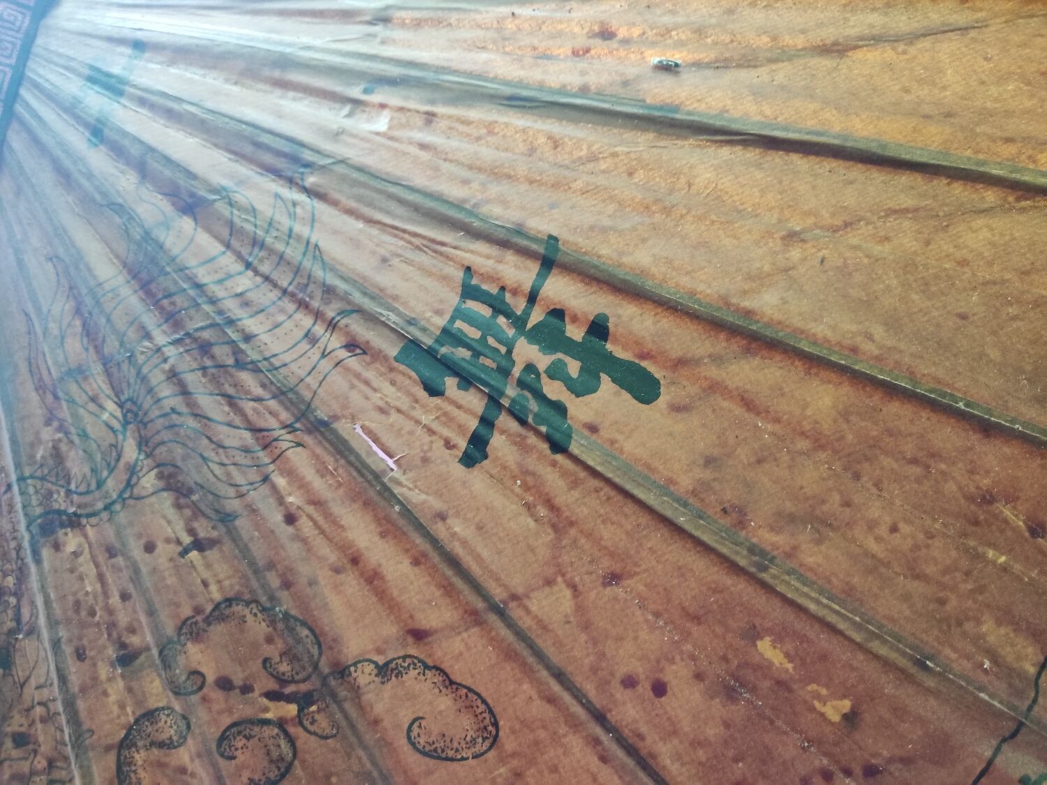 Asian paper and rattan umbrella