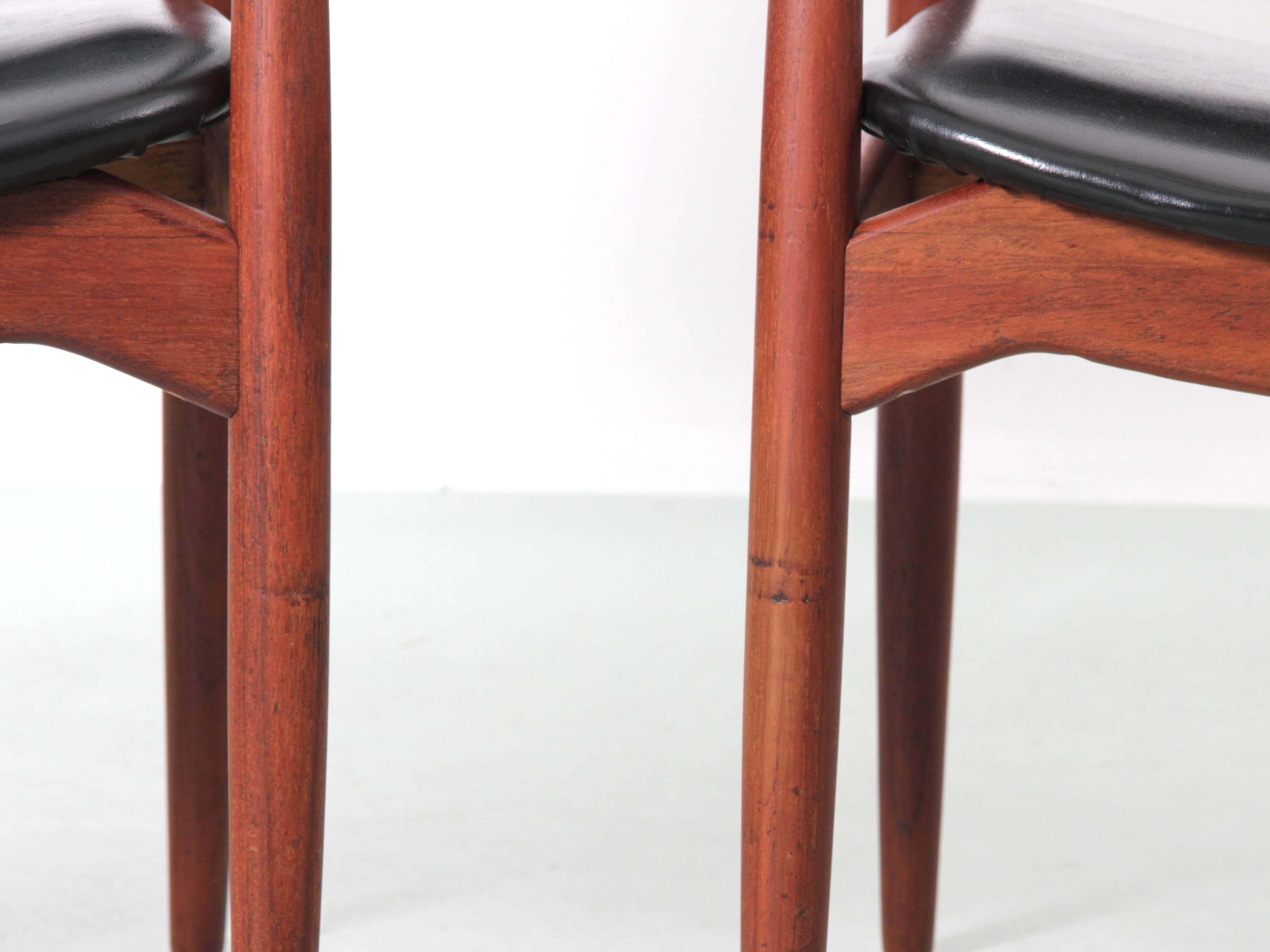 Pair of Scandinavian teak armchairs, model 66