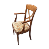 Antique rustic office armchair in cherry wood and fabric.