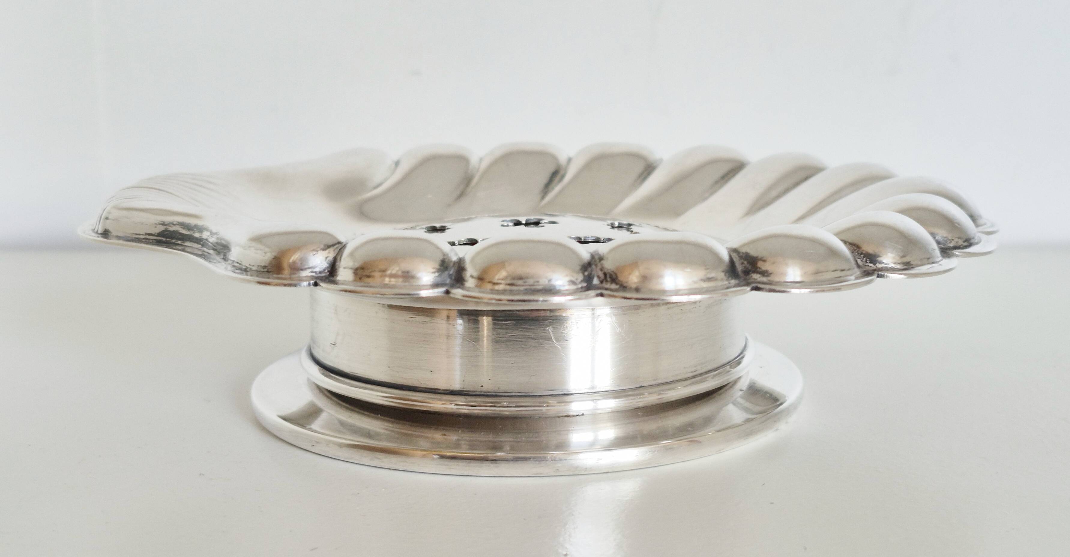 Silver scallop shell butter dish.