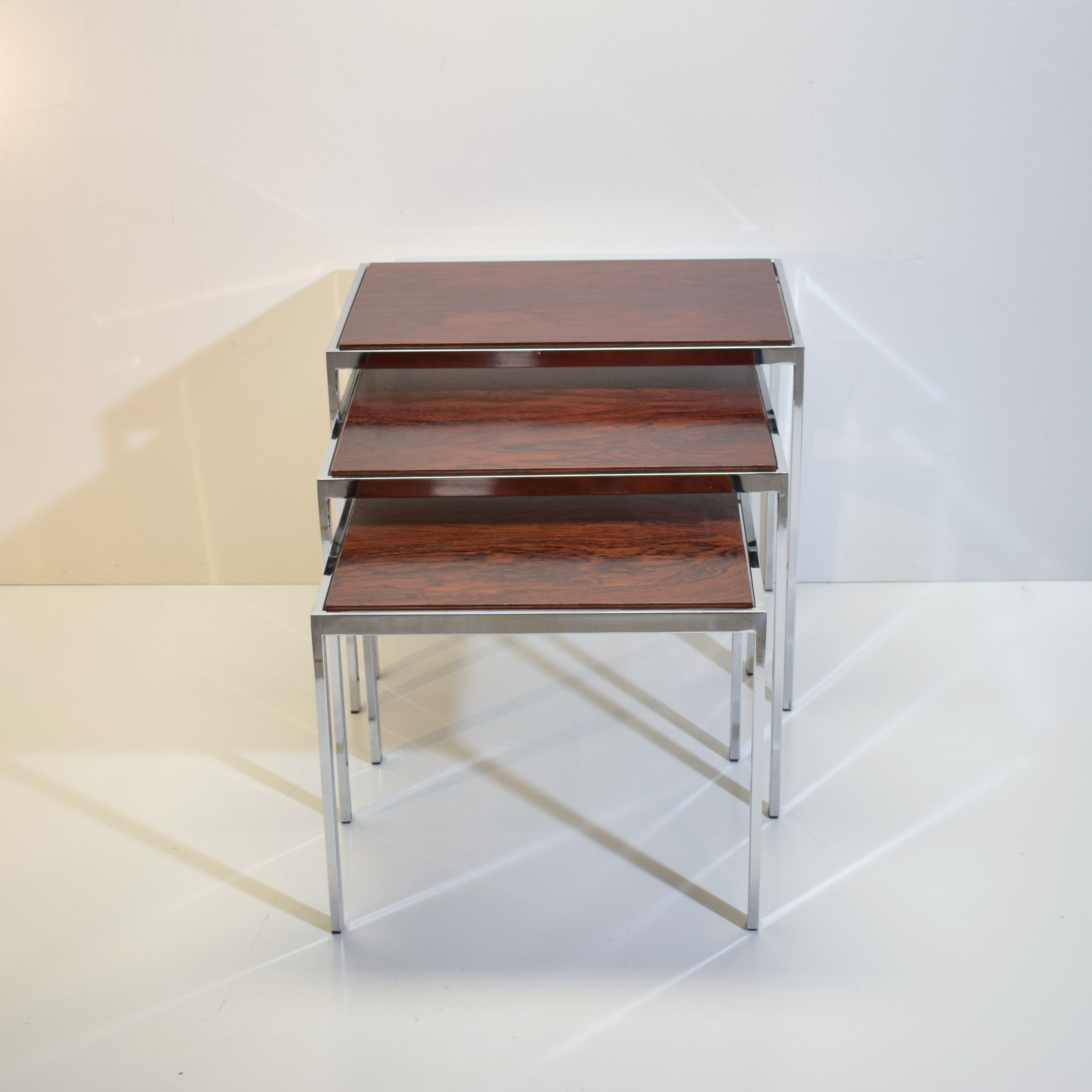 Vintage rosewood and chrome tables with reversible trays