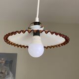Old pendant light with a white opaline glass shade and a wavy border.