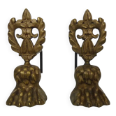 Pair of bronze fire dogs with lion paws. Early 20th century.