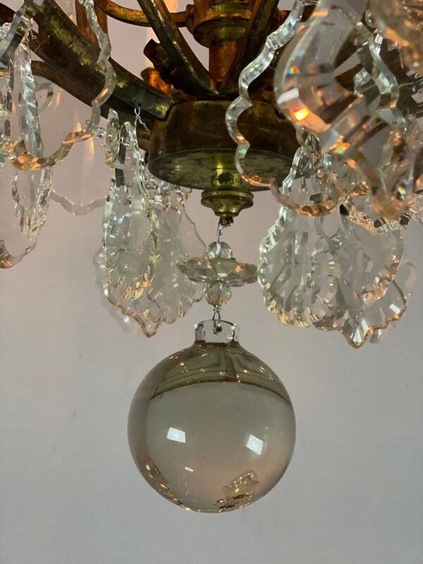 Lustre cage en bronze garni de pampilles de cristal taillé, 12 feux de lumière