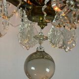 Bronze cage chandelier adorned with cut crystal pendants, 12 lights