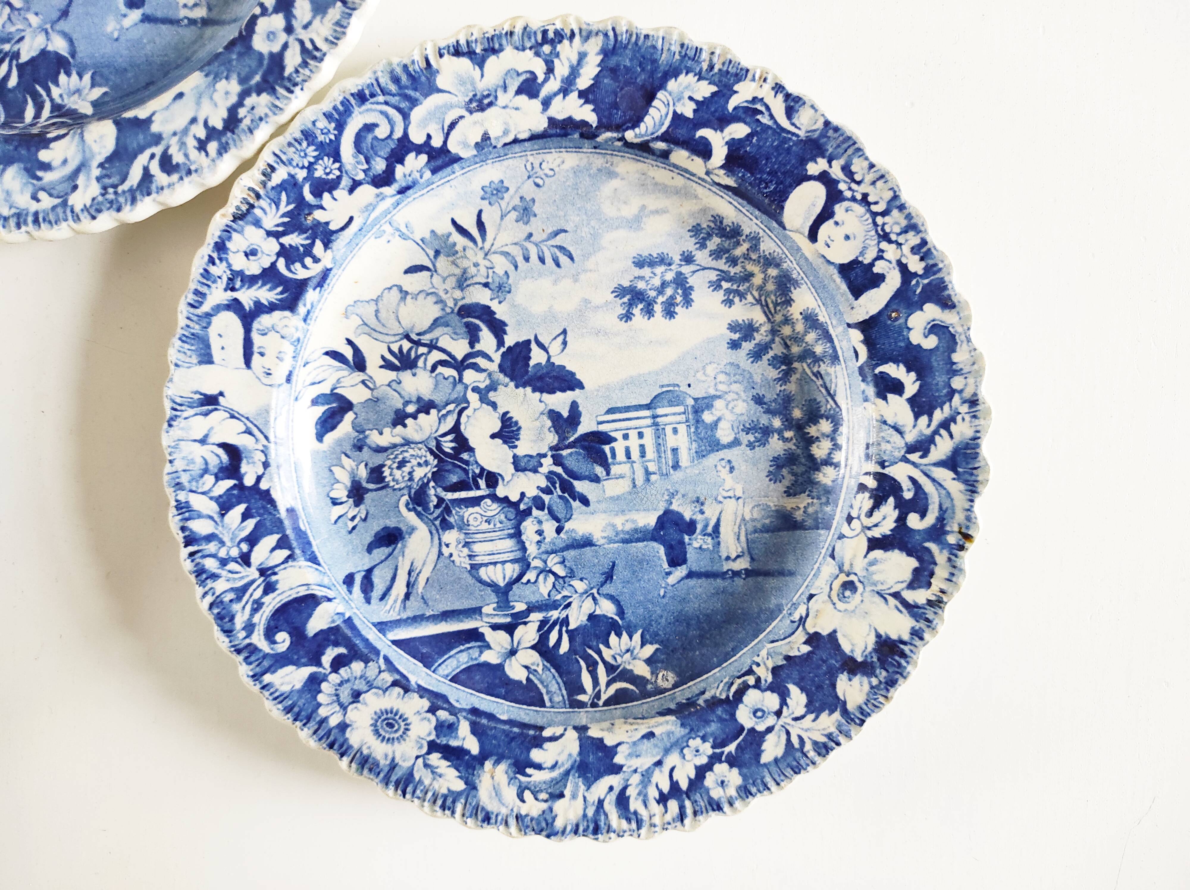 Five 19th century Calais earthenware plates with a romantic gallant couple decor