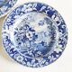 Five 19th century Calais earthenware plates with a romantic gallant couple decor