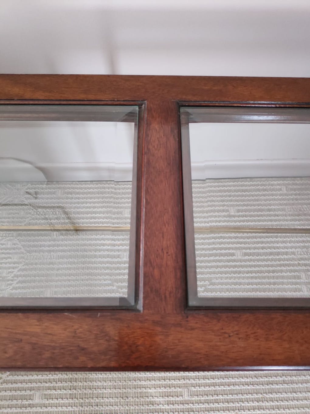 Glass and brass console table