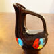 Set of three ceramic pitchers