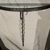 Console design in brushed steel and glass