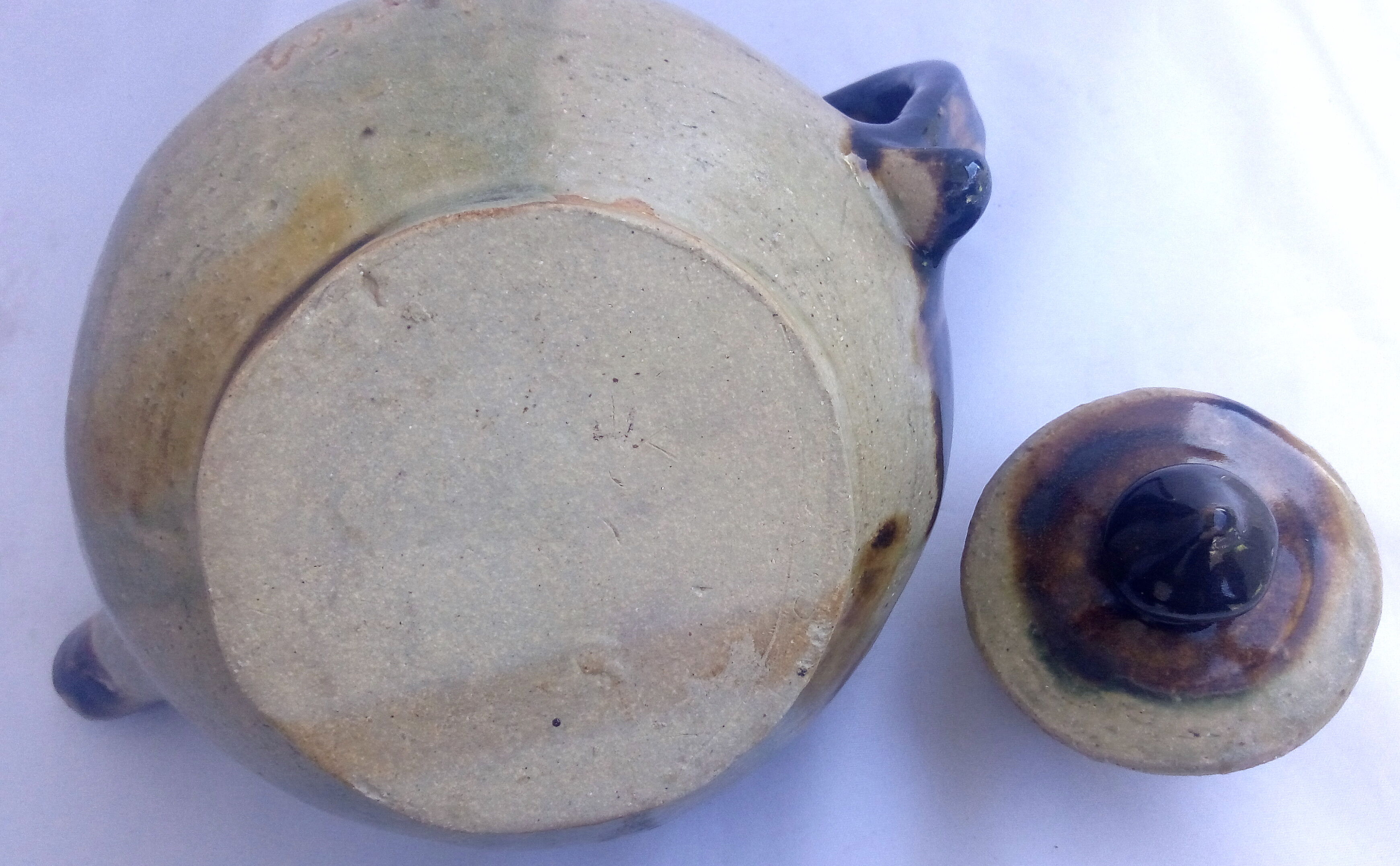 Rustic enamelled sandstone teapot