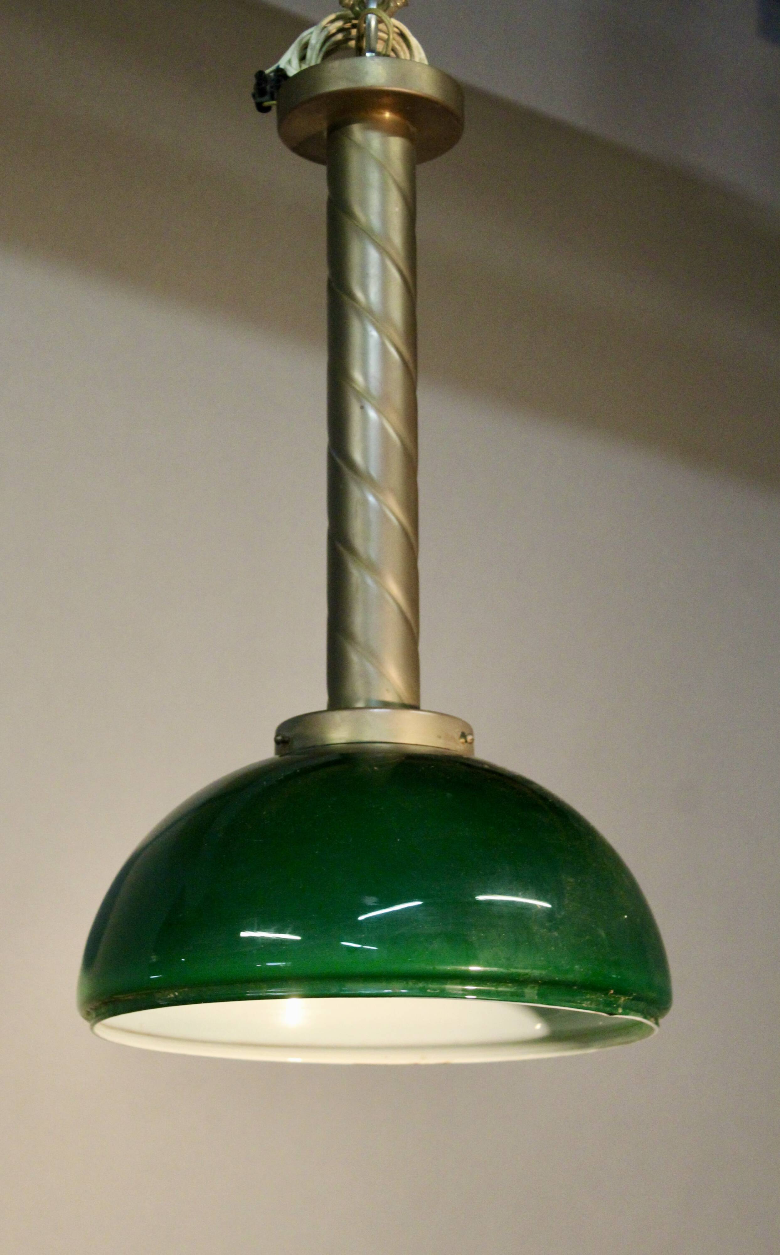 Chandelier with brass body and green opaline