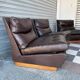 Pair of Roche Bobois leather armchairs