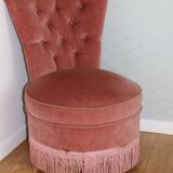 Powder pink fireside chair with fringes