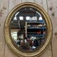 Oval mirror Napoleon III – Gilded with gold leaf – Wood and stucco