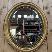 Oval mirror Napoleon III – Gilded with gold leaf – Wood and stucco