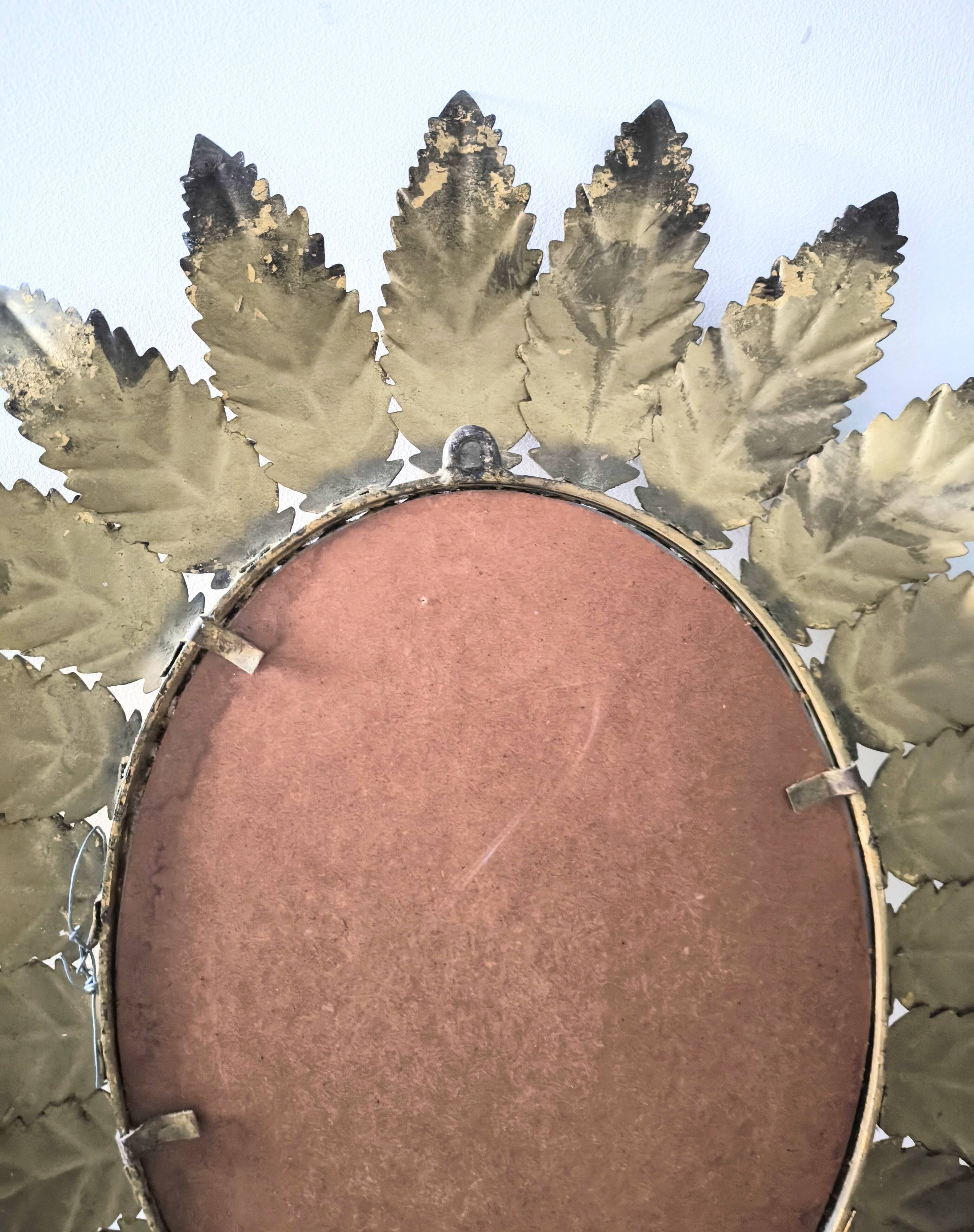 "Sun Mirror" Spanish mirror from the 1960s, made of gold metal.