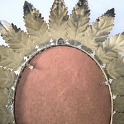 Miroir «Sun Mirror» espagnol des années 60, en métal doré.