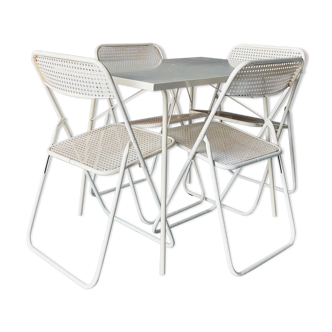Ensemble table pliante et ses 4 chaises pliantes métal perforées couleur crème - années 70