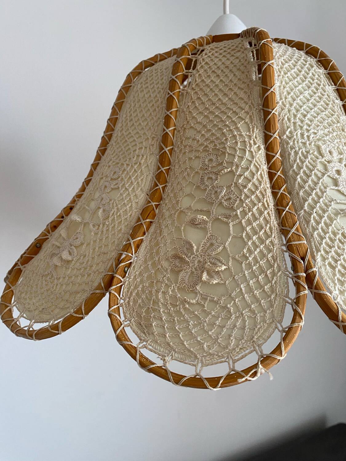 Hanging flower in wood, fabric and hook