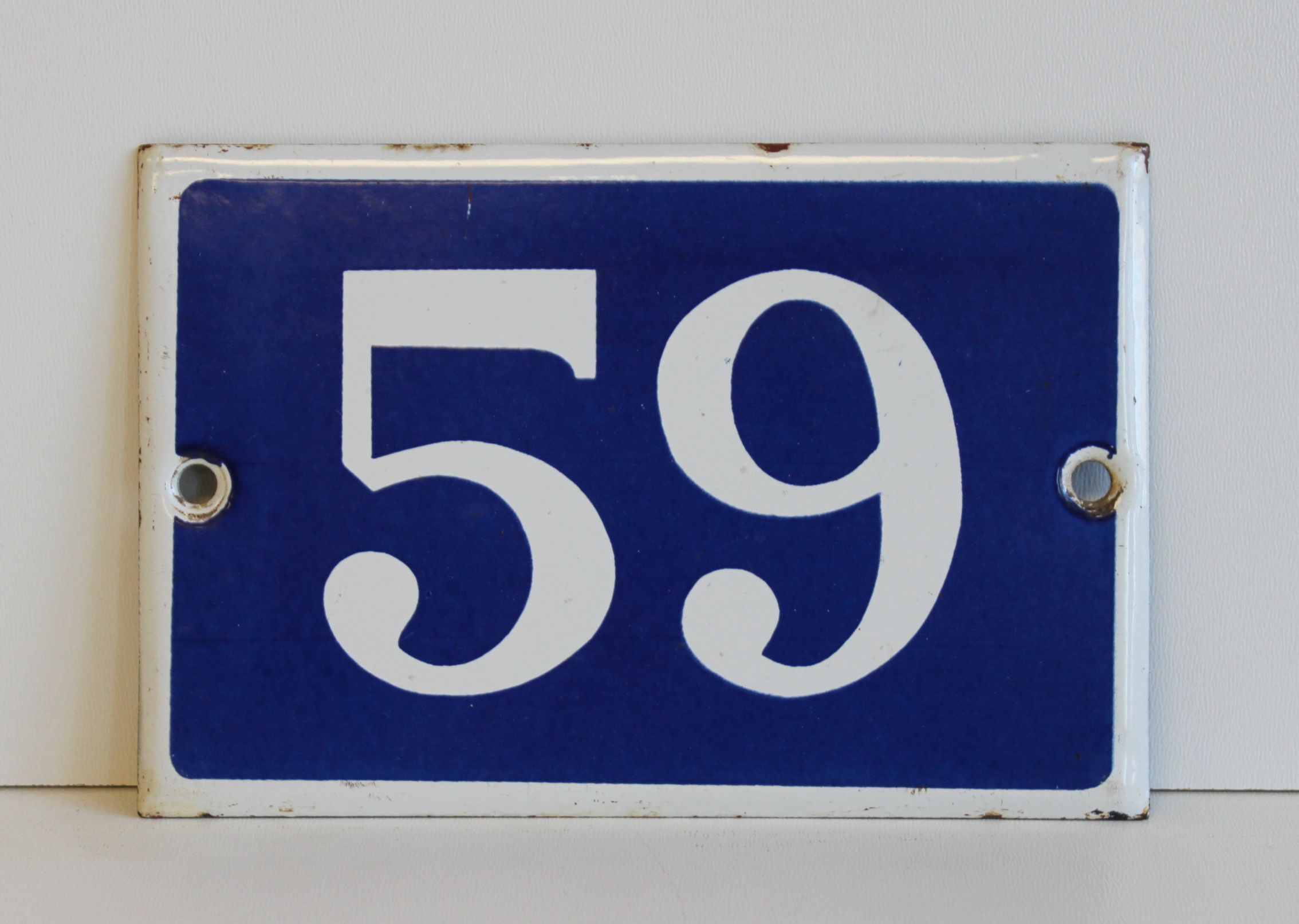 Enamelled street sign, number 59