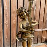 Large bronze candle holder with putti angel