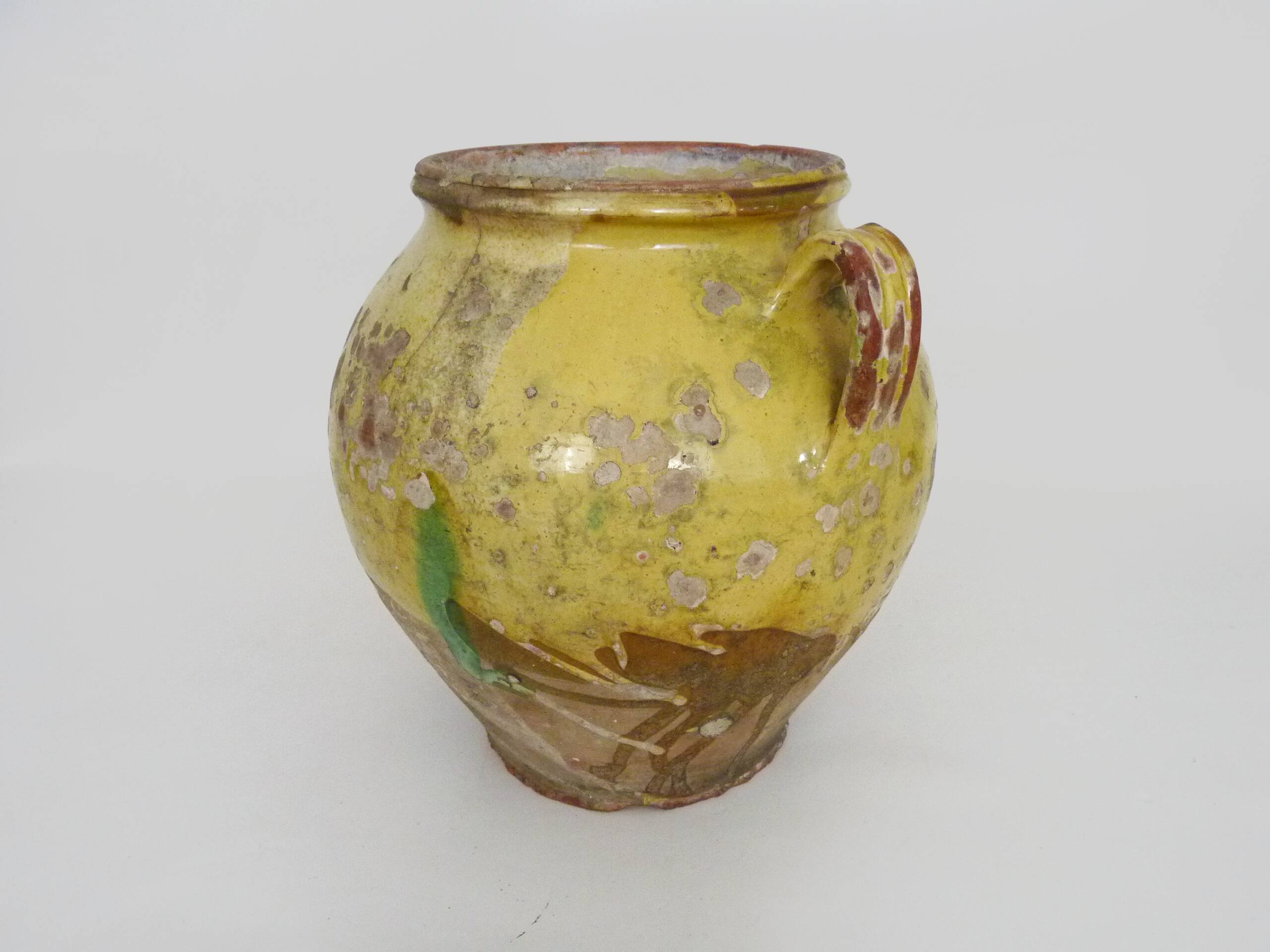 Magnificent glazed yellow confit pot, south-west of France. 19th century.