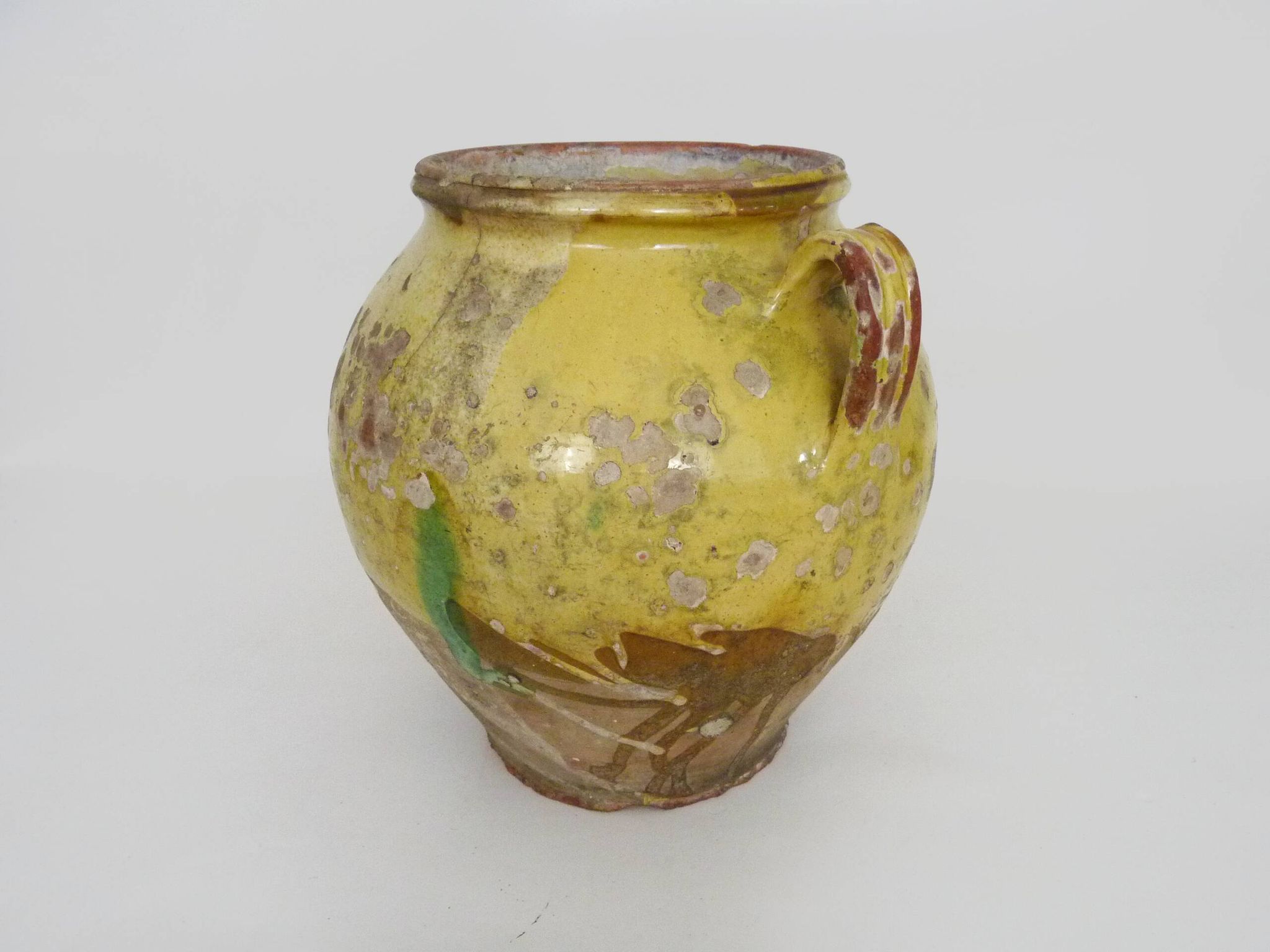 Magnificent glazed yellow confit pot, south-west of France. 19th century.